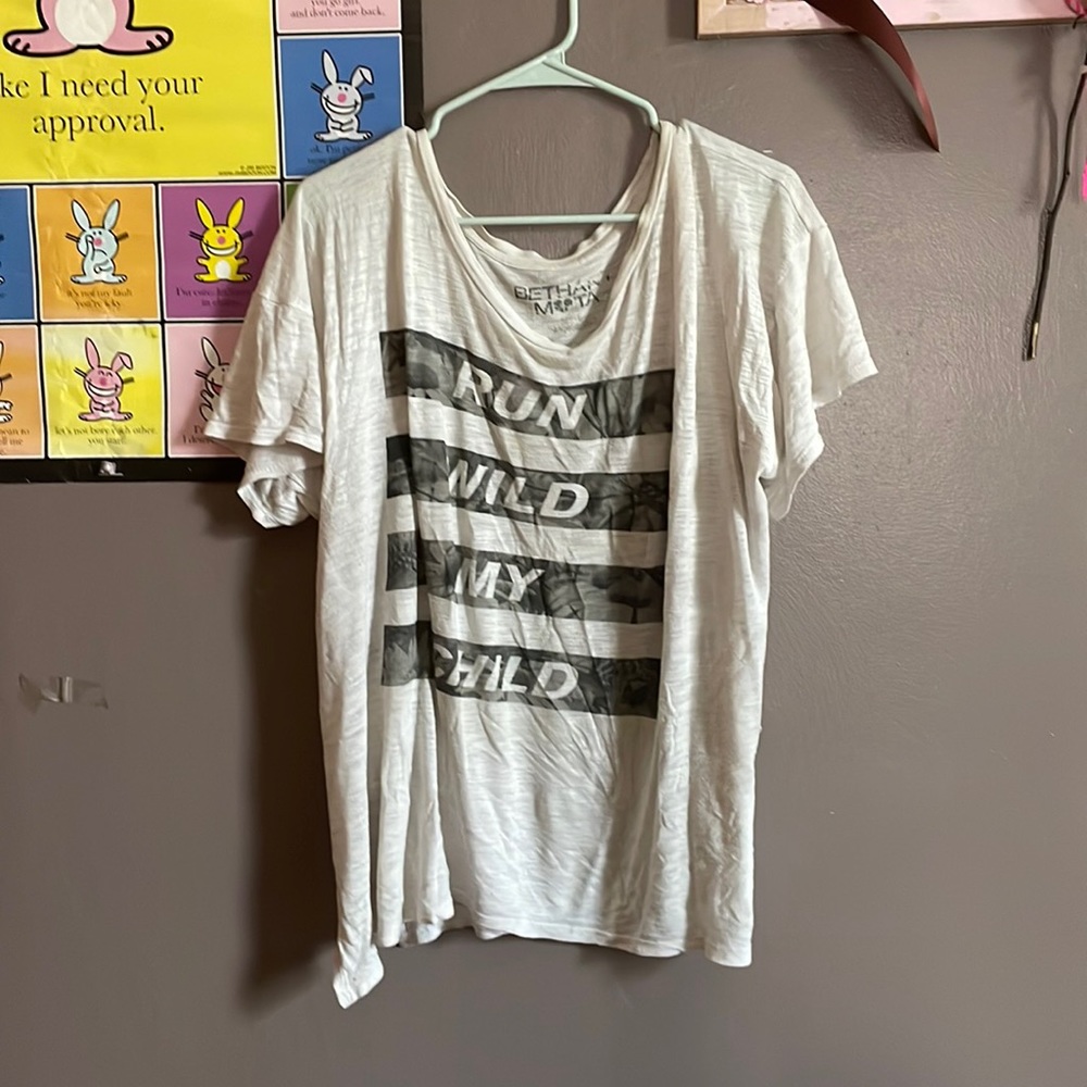 White, thin shirt.